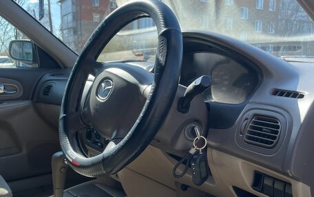 Mazda Familia, 2002 год, 310 000 рублей, 22 фотография