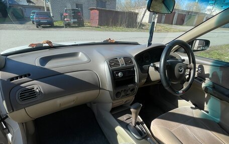 Mazda Familia, 2002 год, 310 000 рублей, 25 фотография