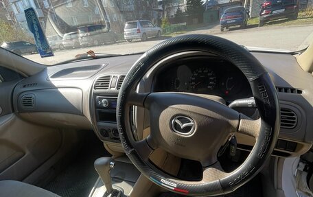 Mazda Familia, 2002 год, 310 000 рублей, 24 фотография