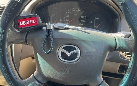 Mazda Familia, 2002 год, 310 000 рублей, 28 фотография