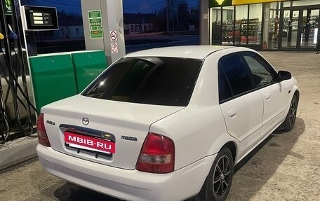 Mazda Familia, 2002 год, 310 000 рублей, 30 фотография