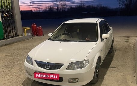 Mazda Familia, 2002 год, 310 000 рублей, 32 фотография