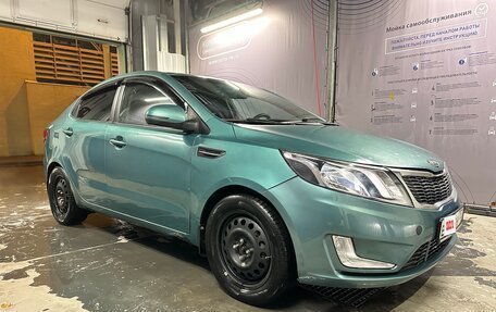 KIA Rio III рестайлинг, 2011 год, 600 000 рублей, 23 фотография