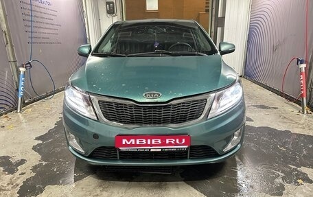 KIA Rio III рестайлинг, 2011 год, 600 000 рублей, 24 фотография