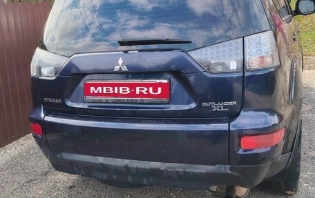 Mitsubishi Outlander III рестайлинг 3, 2010 год, 855 000 рублей, 2 фотография