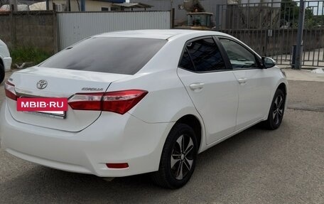 Toyota Corolla, 2013 год, 1 050 000 рублей, 5 фотография