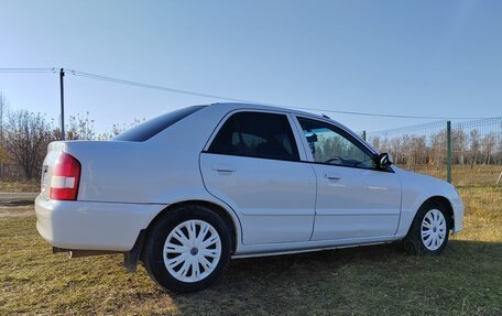 Mazda Familia, 2001 год, 310 000 рублей, 3 фотография