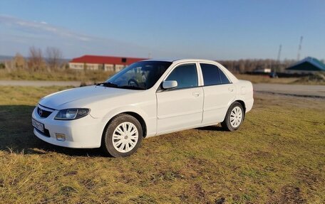 Mazda Familia, 2001 год, 310 000 рублей, 2 фотография