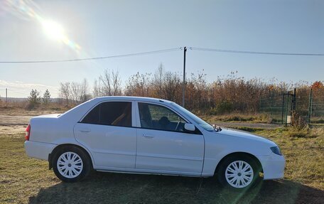 Mazda Familia, 2001 год, 310 000 рублей, 4 фотография