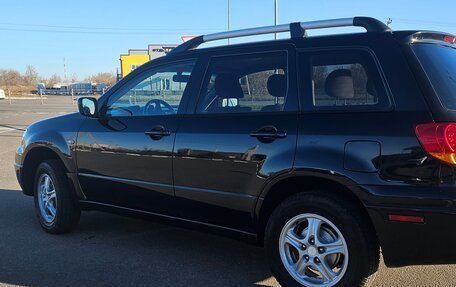 Mitsubishi Outlander III рестайлинг 3, 2003 год, 675 000 рублей, 5 фотография