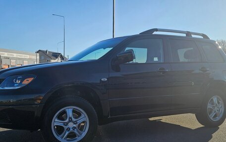 Mitsubishi Outlander III рестайлинг 3, 2003 год, 675 000 рублей, 6 фотография