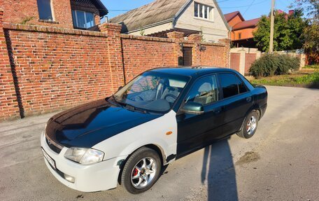 Mazda 323, 1998 год, 280 000 рублей, 8 фотография