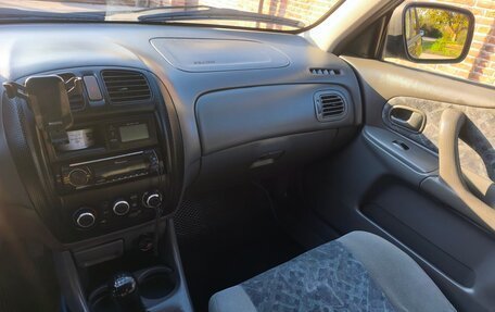 Mazda 323, 1998 год, 280 000 рублей, 12 фотография