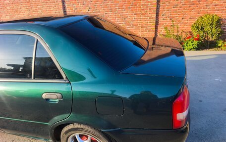 Mazda 323, 1998 год, 280 000 рублей, 17 фотография