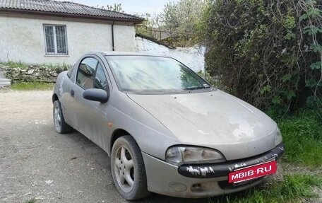 Opel Tigra, 1995 год, 100 000 рублей, 6 фотография