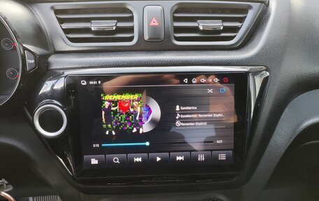 KIA Rio III рестайлинг, 2012 год, 700 000 рублей, 13 фотография