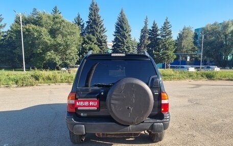 Chevrolet Tracker II, 1999 год, 425 000 рублей, 8 фотография